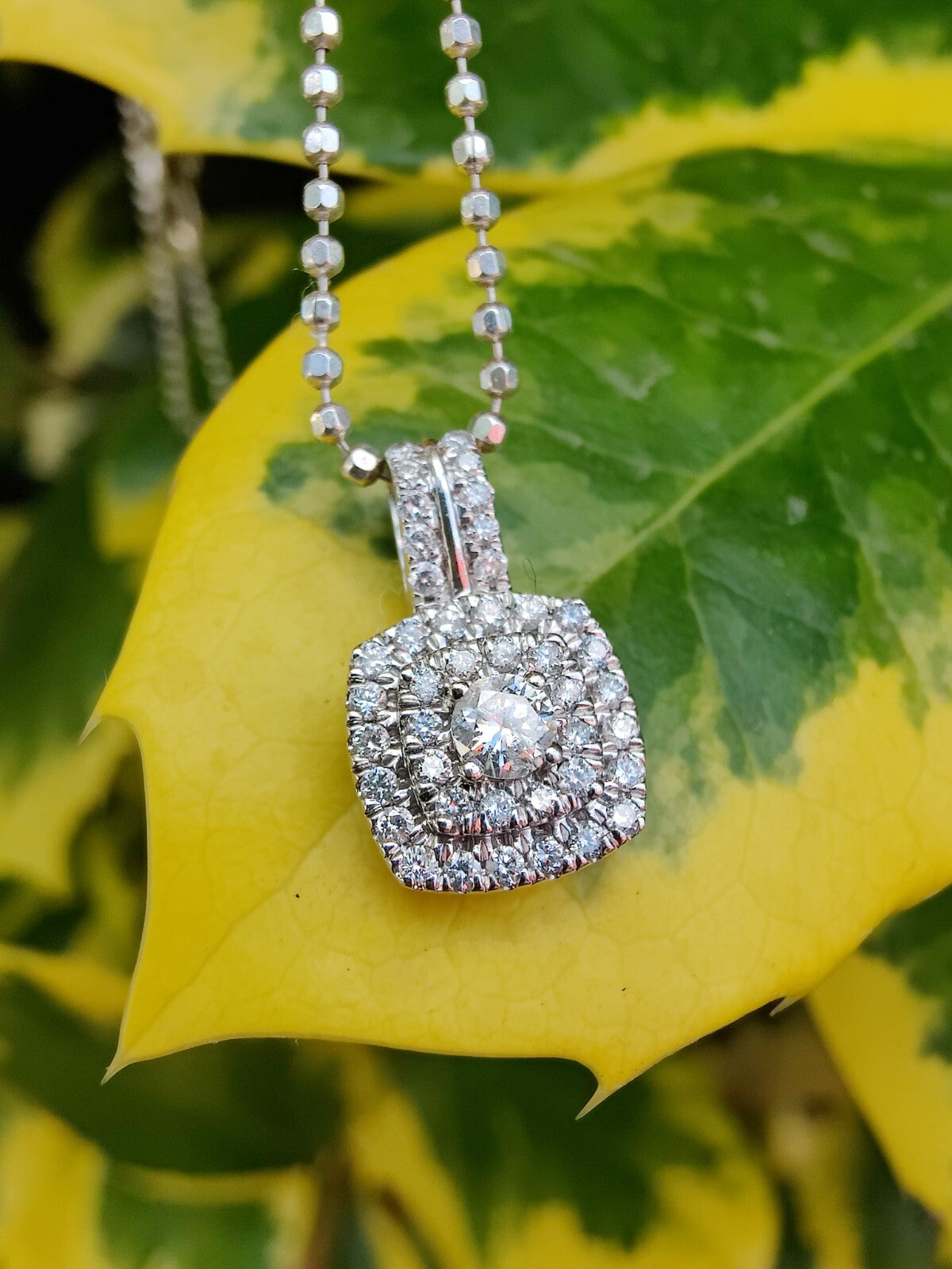 9ct White Gold, 0.5ct Brilliant Cut Diamond Halo Pendant Square Shape