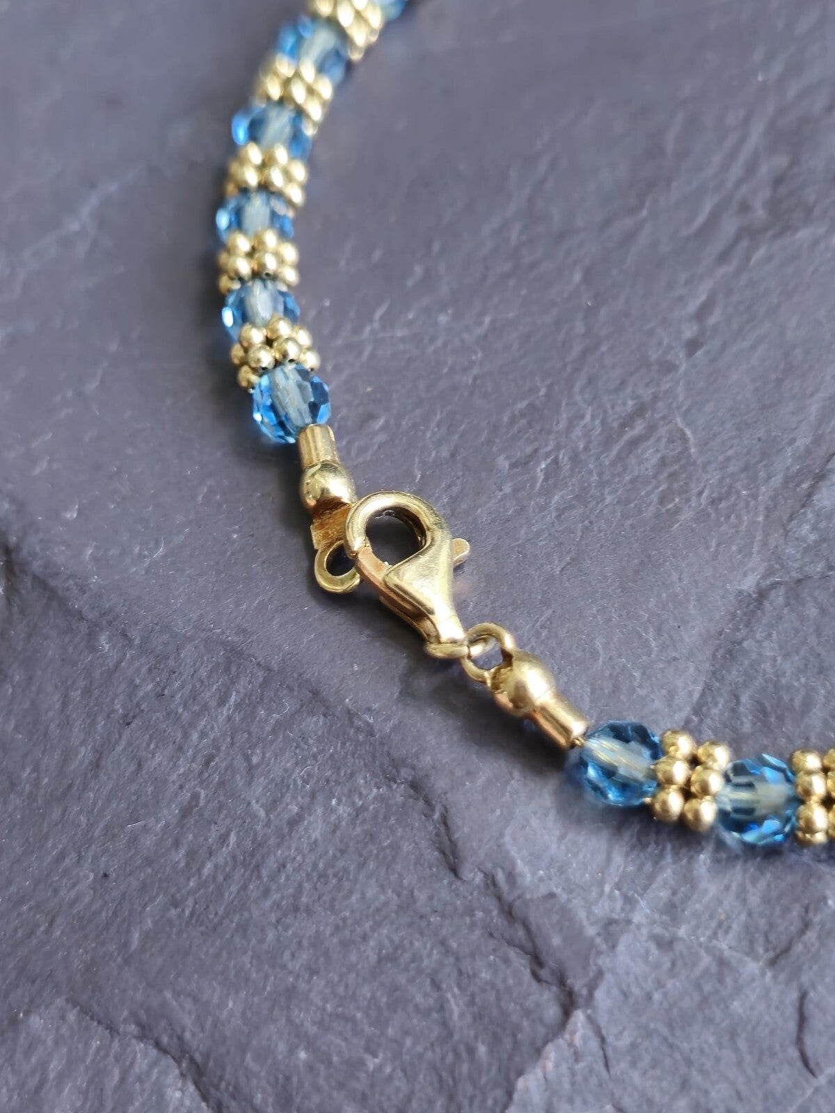18k Yellow Gold And Blue Topaz Beaded Bracelet 8.5inch with Gold Bars Between